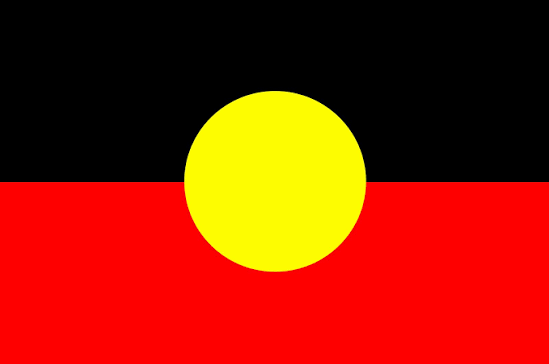 Australian Aboriginal flag with black and red fields and yellow sun