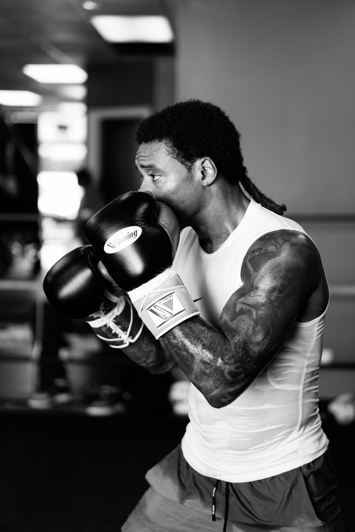 Close view of Errol Spence Jr. training in boxing gloves